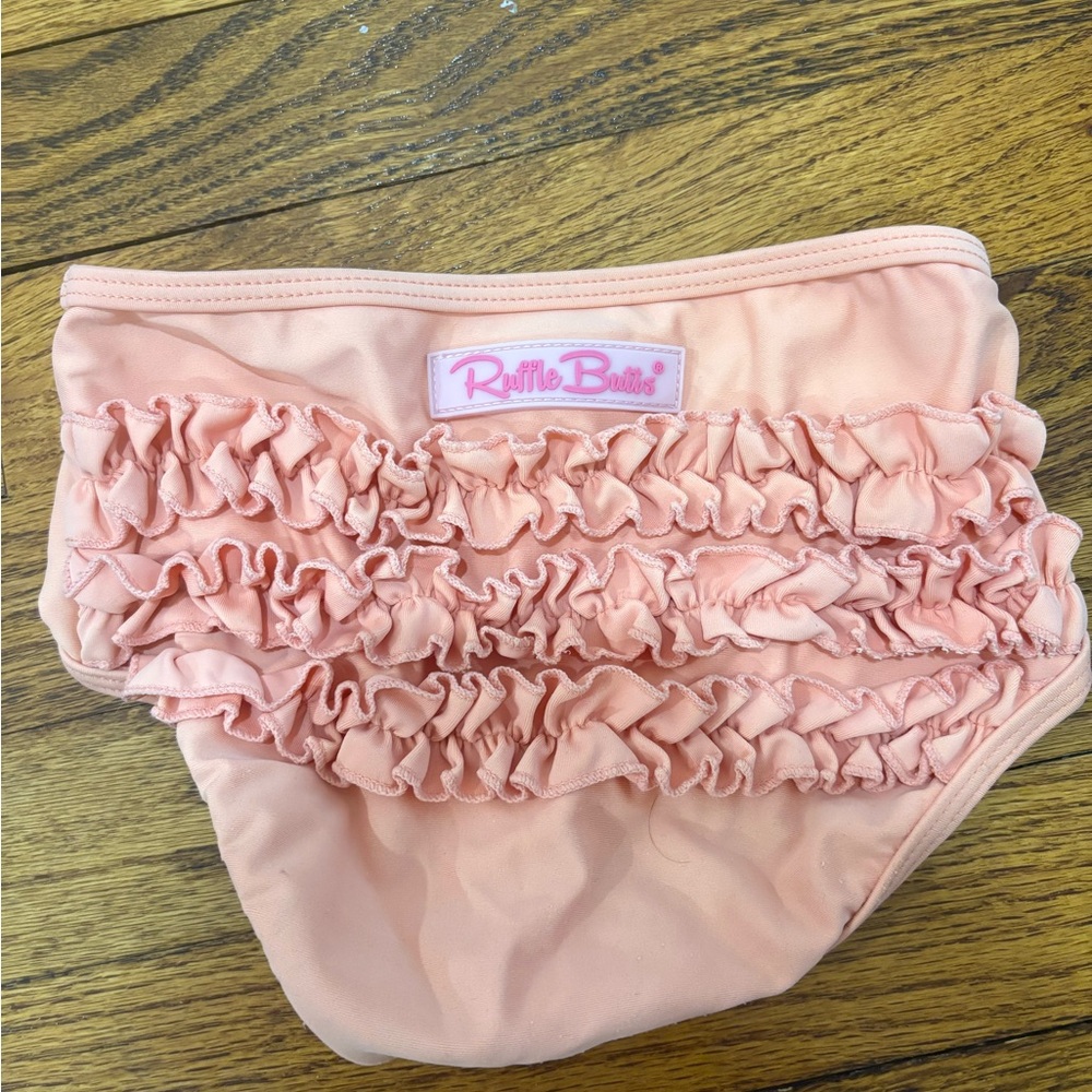 Ruffle Butts Pink Swim bottom for babies and toddlers